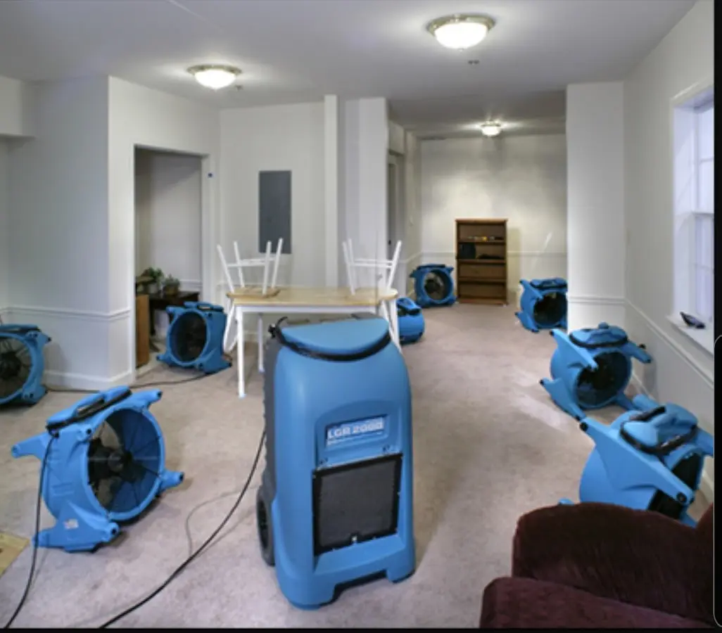 Air movers and dehumidifier setup for Water Damage Restoration in Fort Edward